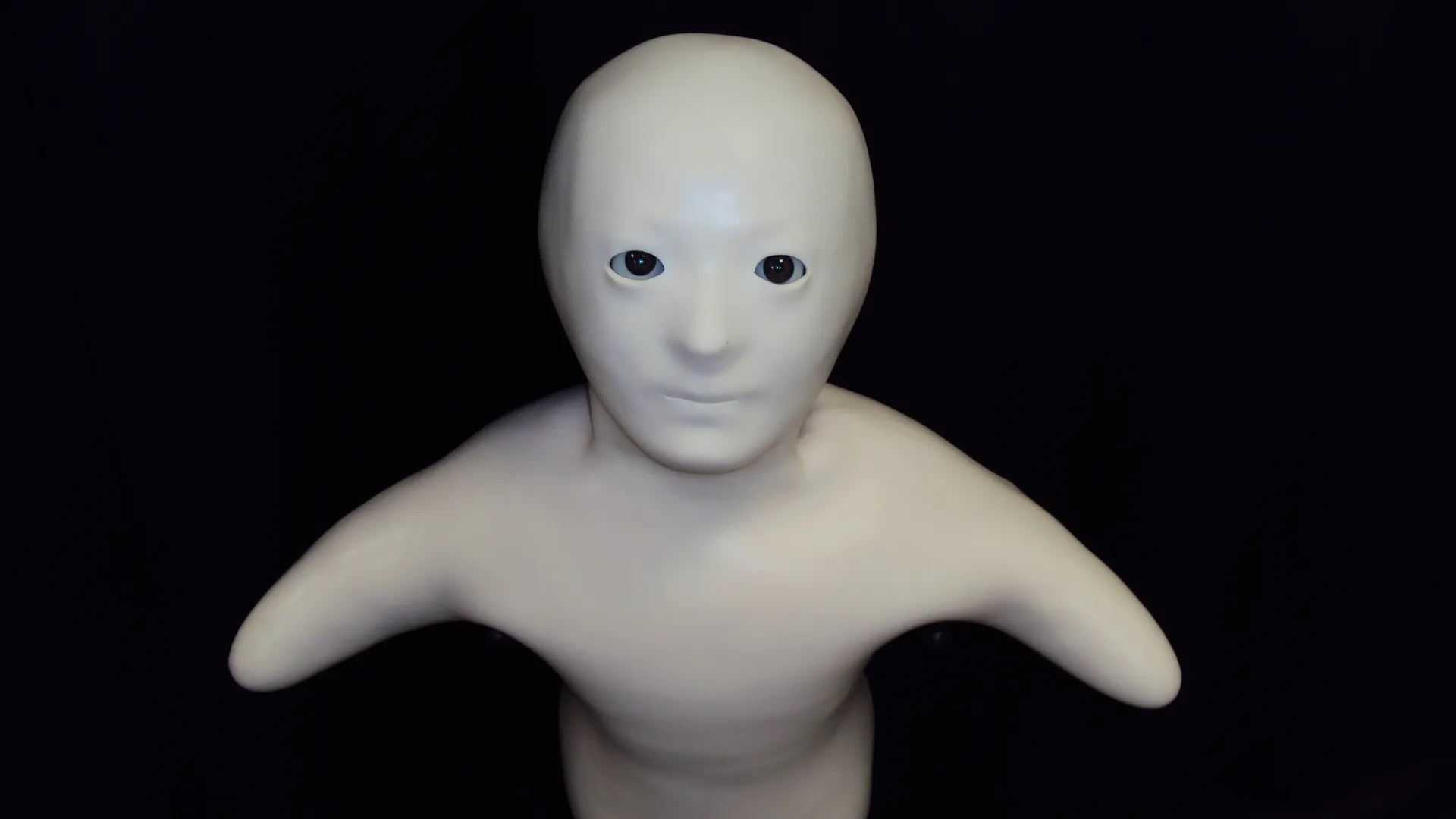 Pale humanoid staring from the dark