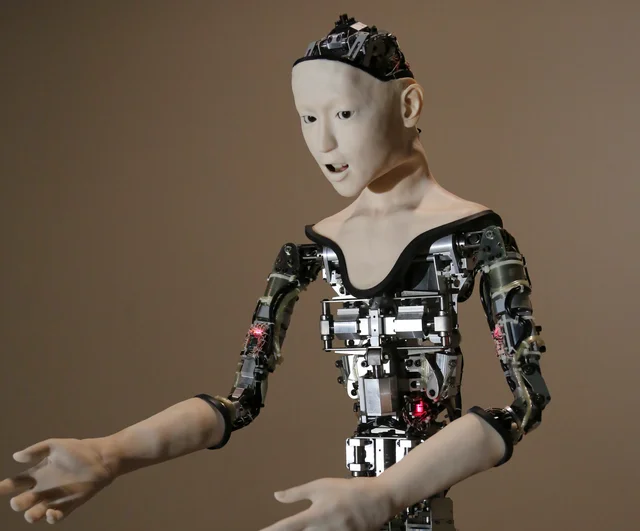Humanoid with exposed mechanical torso